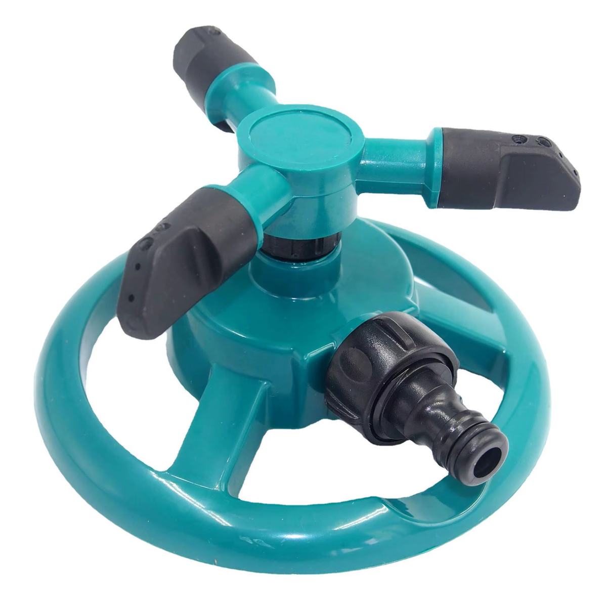 Garden sprinkler in use on a garden bed