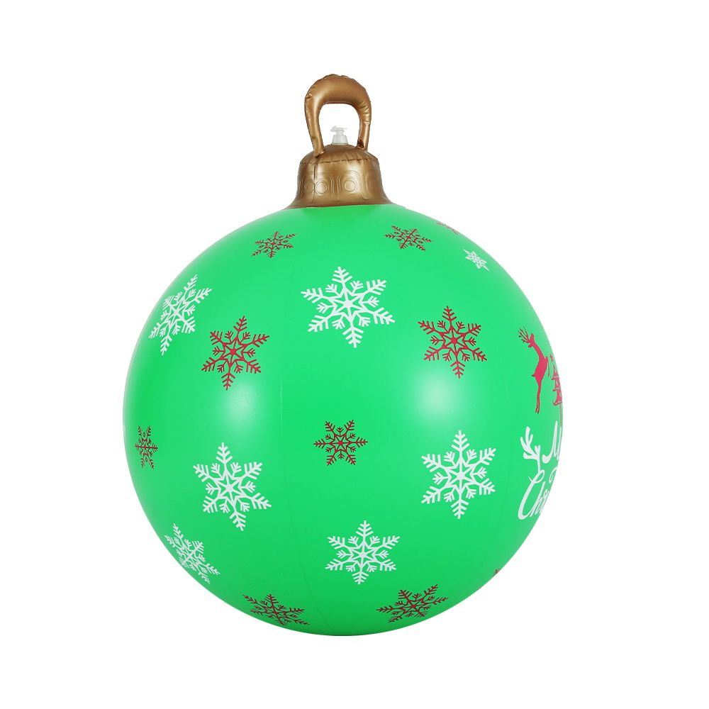 Green giant bauble hanging from a tree outdoors